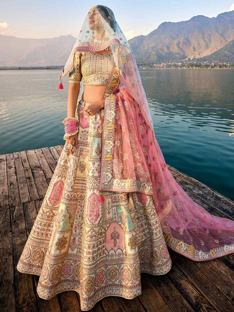 Beige Silk Embroidered Wedding Bridal Heavy Border Lehenga Choli