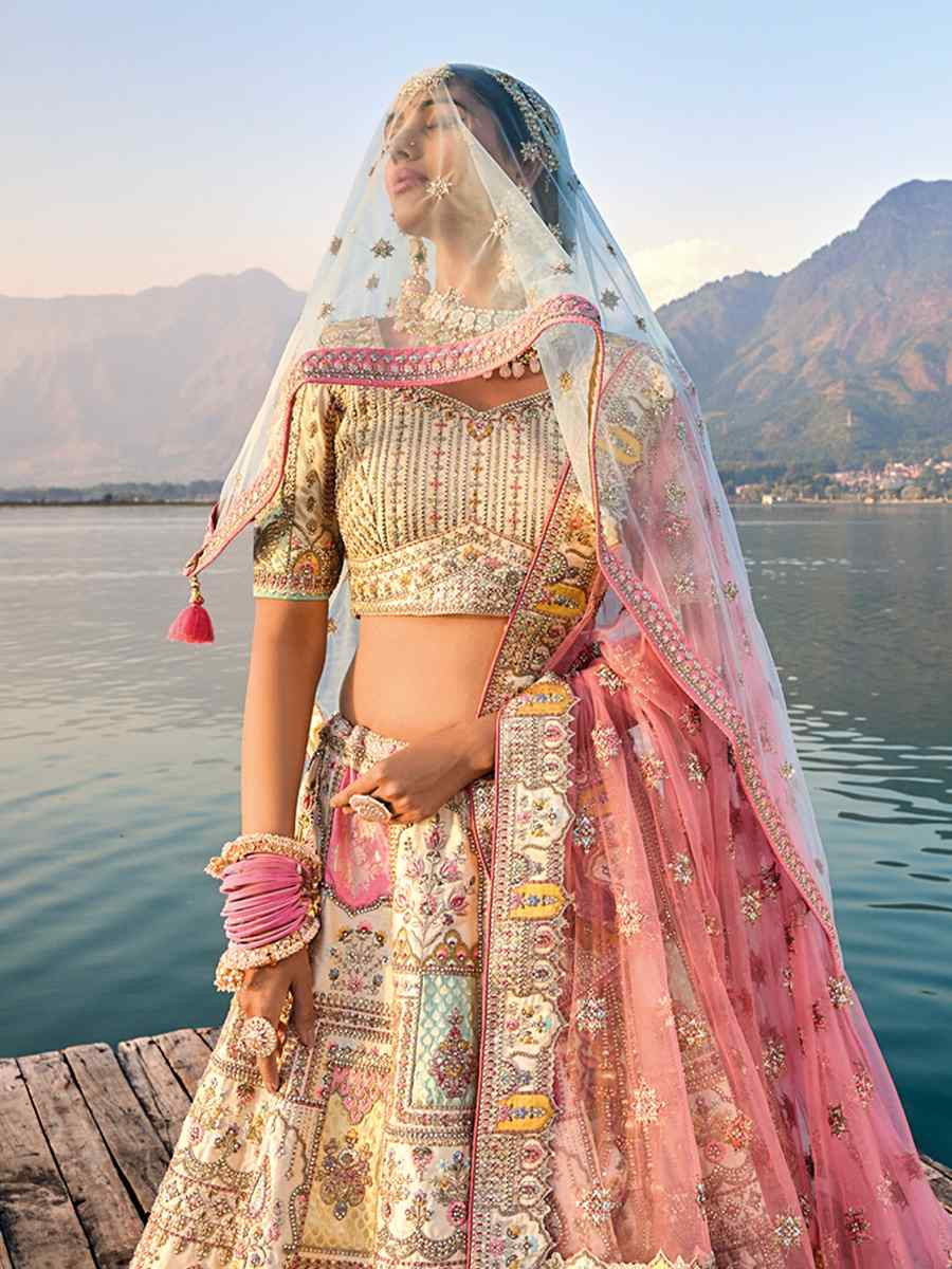 Beige Silk Embroidered Wedding Bridal Heavy Border Lehenga Choli