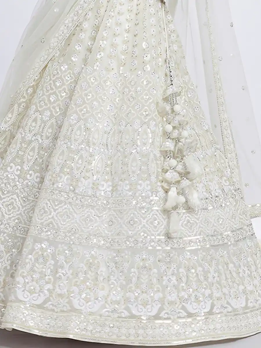 Cream Net Embroidery Reception Party Wear Heavy Border Lehenga Choli