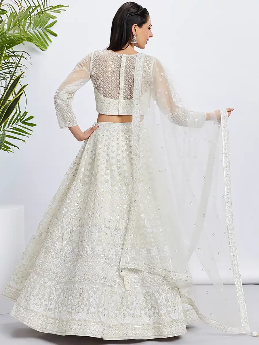 Cream Net Embroidery Reception Party Wear Heavy Border Lehenga Choli