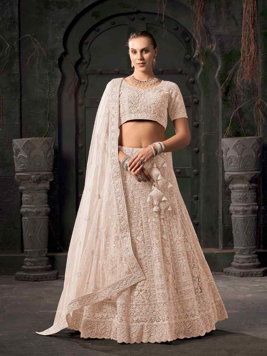 Cream Premium Net Embroidered Reception Party Wear Heavy Border Lehenga Choli