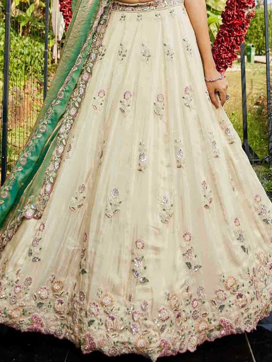 Cream Tissue Embroidery Reception Party Wear Heavy Border Lehenga Choli