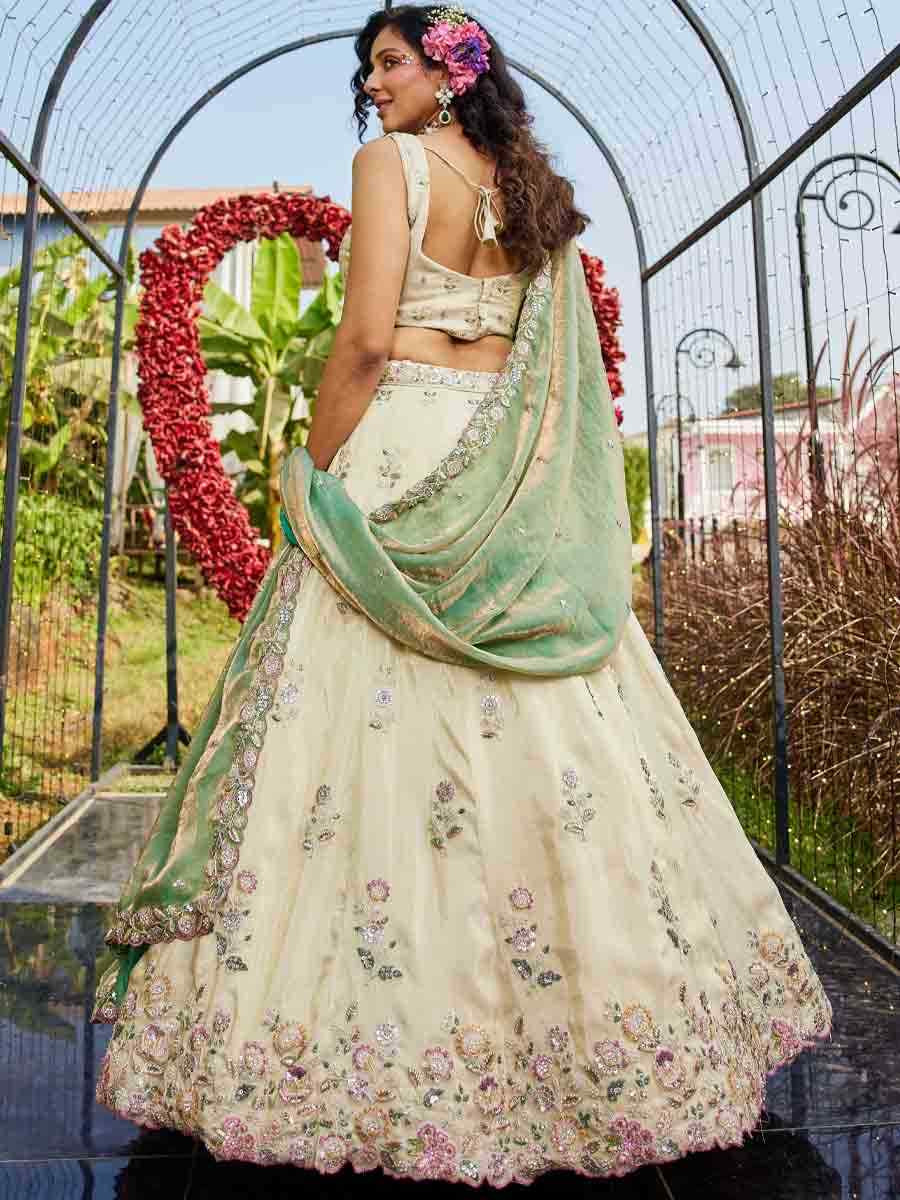 Cream Tissue Embroidery Reception Party Wear Heavy Border Lehenga Choli