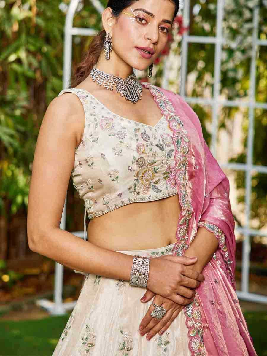 Cream Tissue Embroidery Reception Party Wear Heavy Border Lehenga Choli