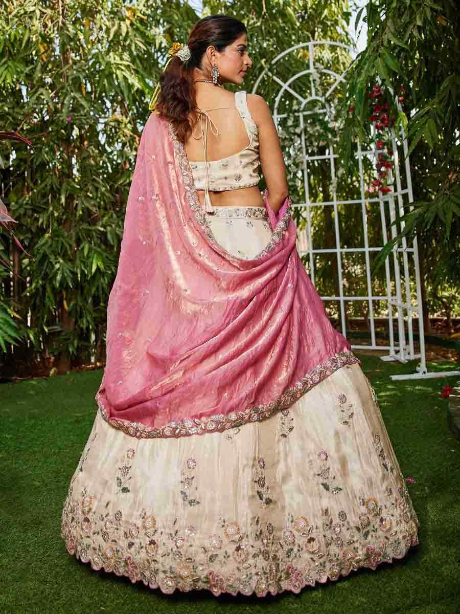 Cream Tissue Embroidery Reception Party Wear Heavy Border Lehenga Choli