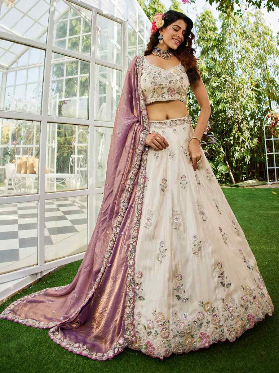 Cream Tissue Embroidery Reception Party Wear Heavy Border Lehenga Choli