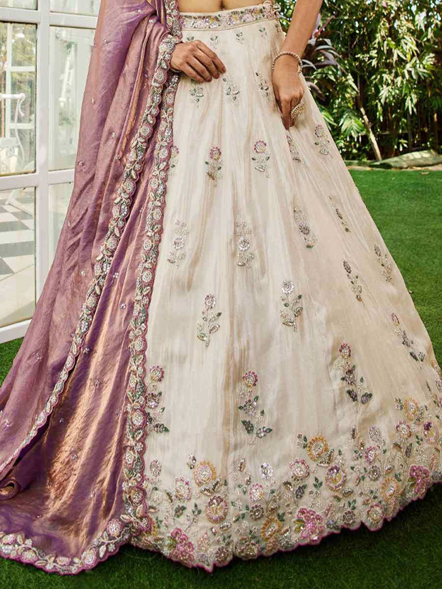 Cream Tissue Embroidery Reception Party Wear Heavy Border Lehenga Choli