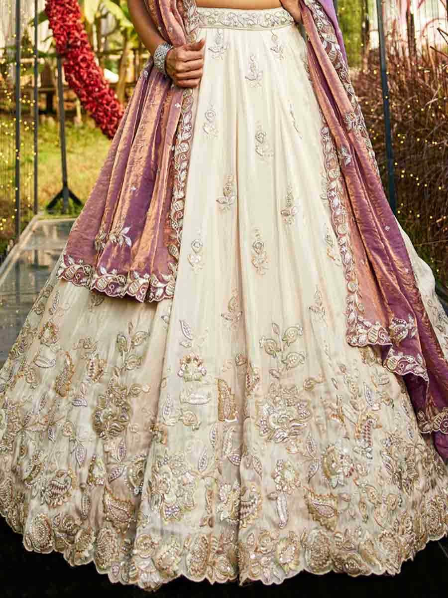 Cream Tissue Embroidery Reception Party Wear Heavy Border Lehenga Choli