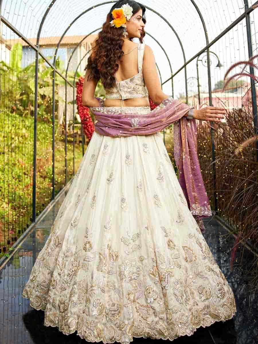 Cream Tissue Embroidery Reception Party Wear Heavy Border Lehenga Choli