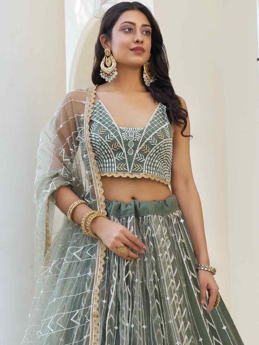 Dusty Green Butterfly Net Embroidered Wedding Festival Heavy Border Lehenga Choli