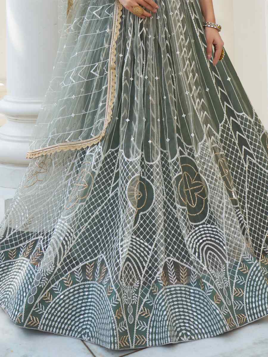 Dusty Green Butterfly Net Embroidered Wedding Festival Heavy Border Lehenga Choli