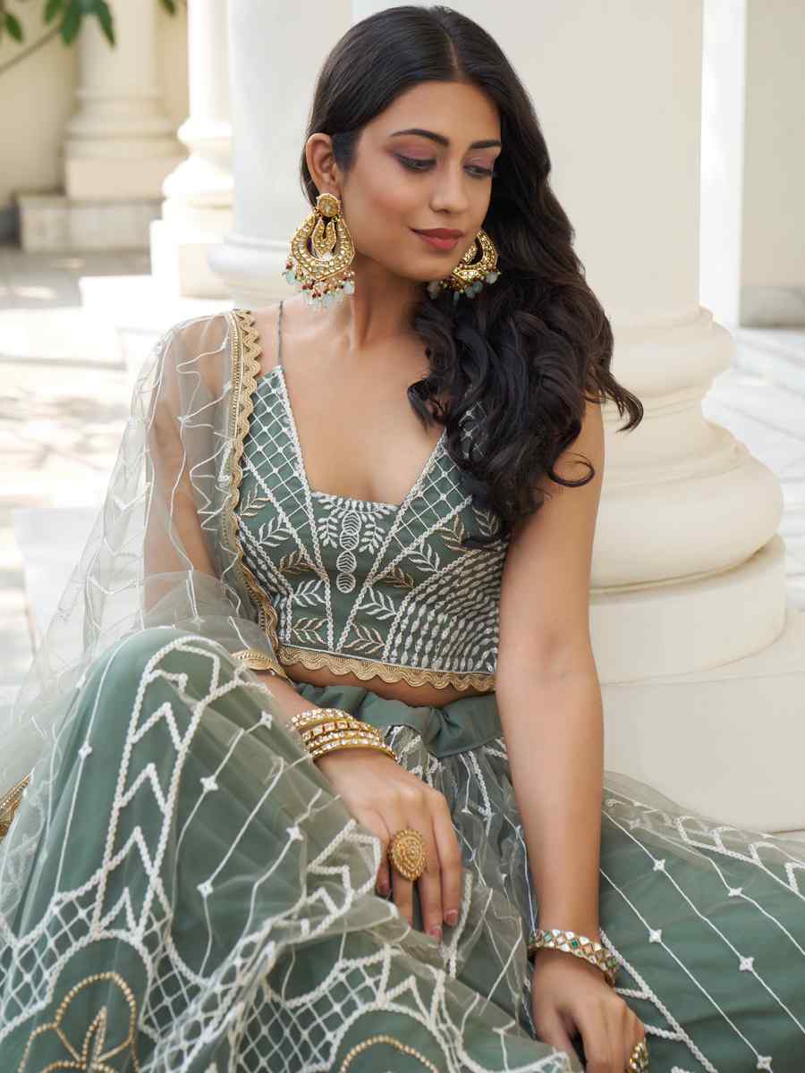 Dusty Green Butterfly Net Embroidered Wedding Festival Heavy Border Lehenga Choli