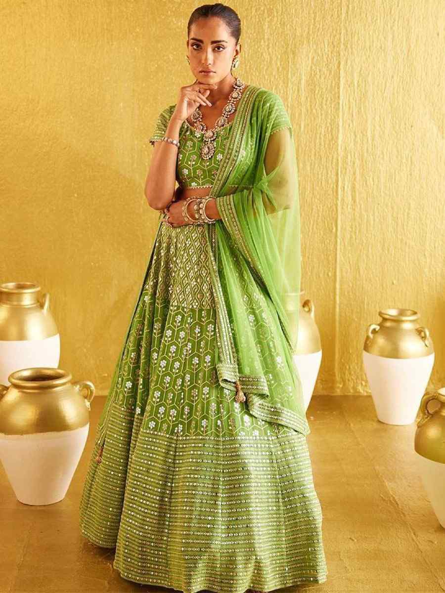 Green Banglory Silk Embroidery Reception Party Wear Heavy Border Lehenga Choli