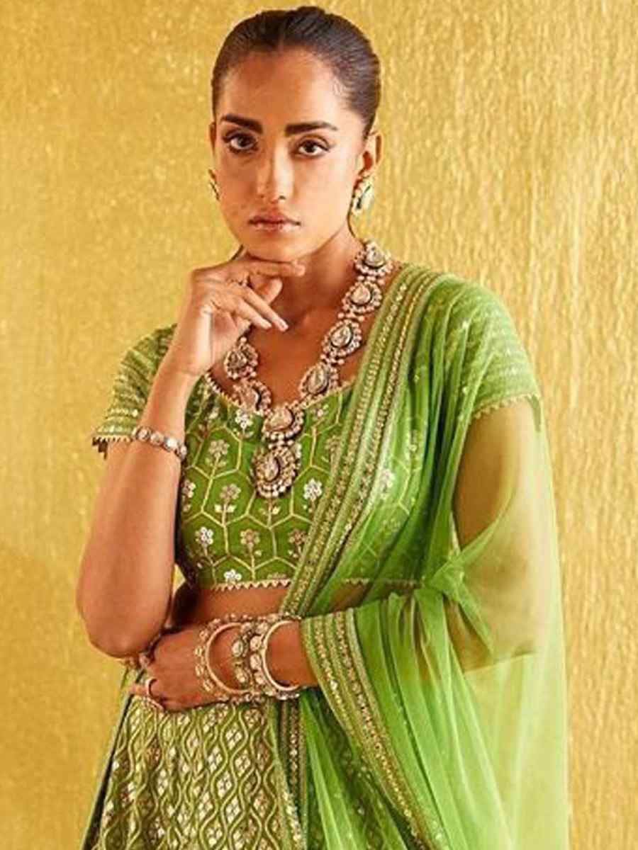 Green Banglory Silk Embroidery Reception Party Wear Heavy Border Lehenga Choli