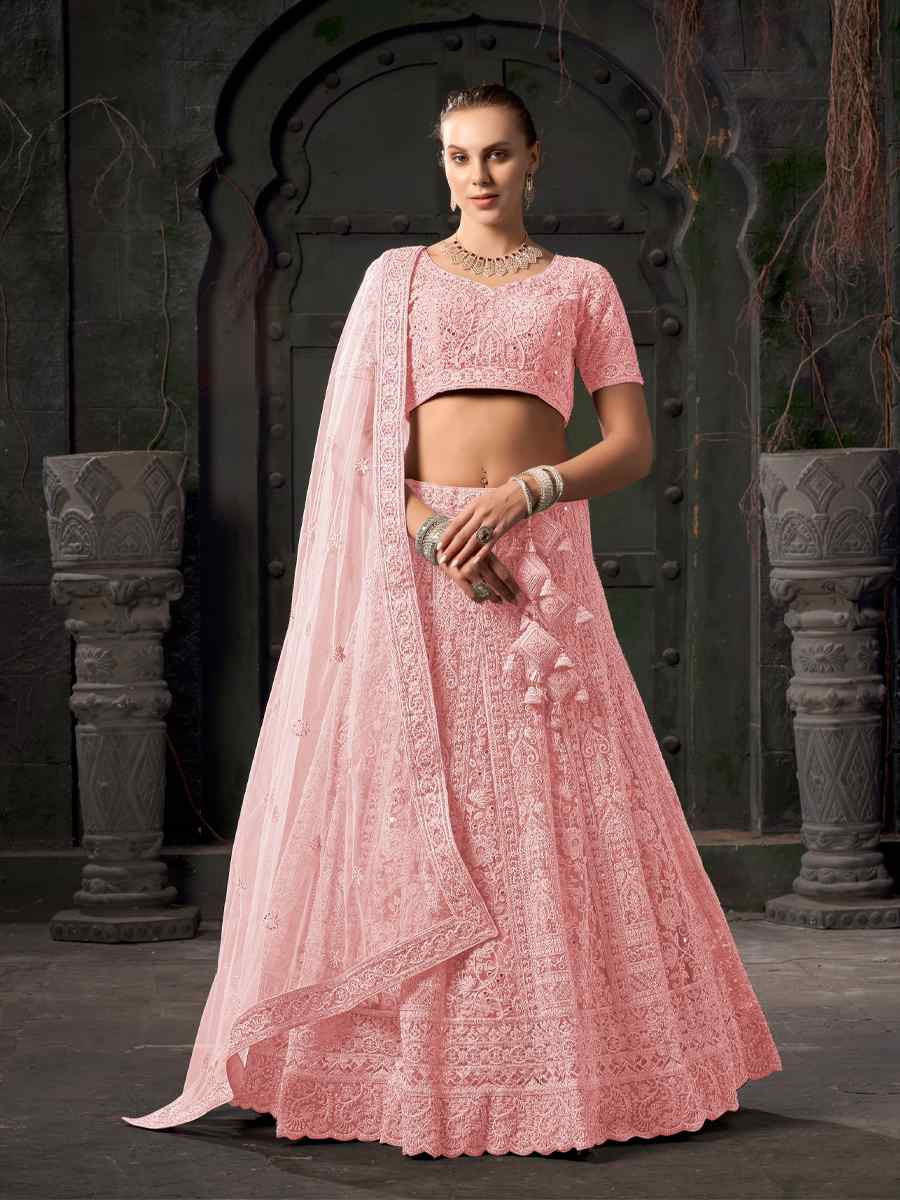 Light Pink Premium Net Embroidered Reception Party Wear Heavy Border Lehenga Choli