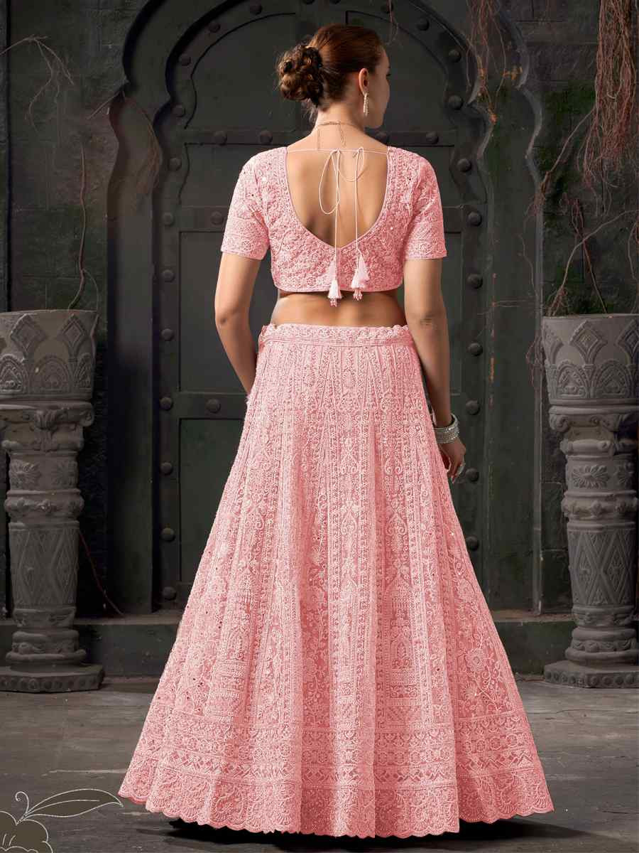 Light Pink Premium Net Embroidered Reception Party Wear Heavy Border Lehenga Choli