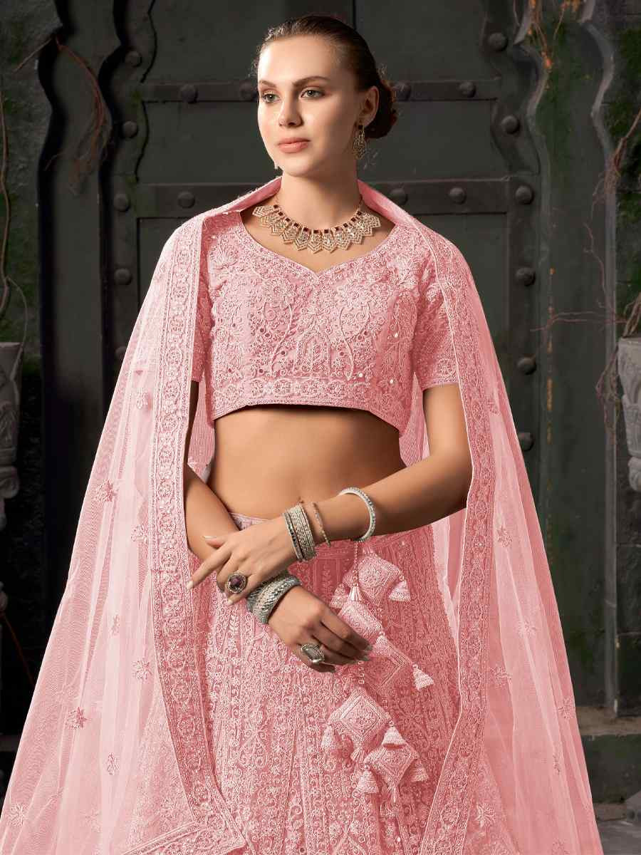 Light Pink Premium Net Embroidered Reception Party Wear Heavy Border Lehenga Choli