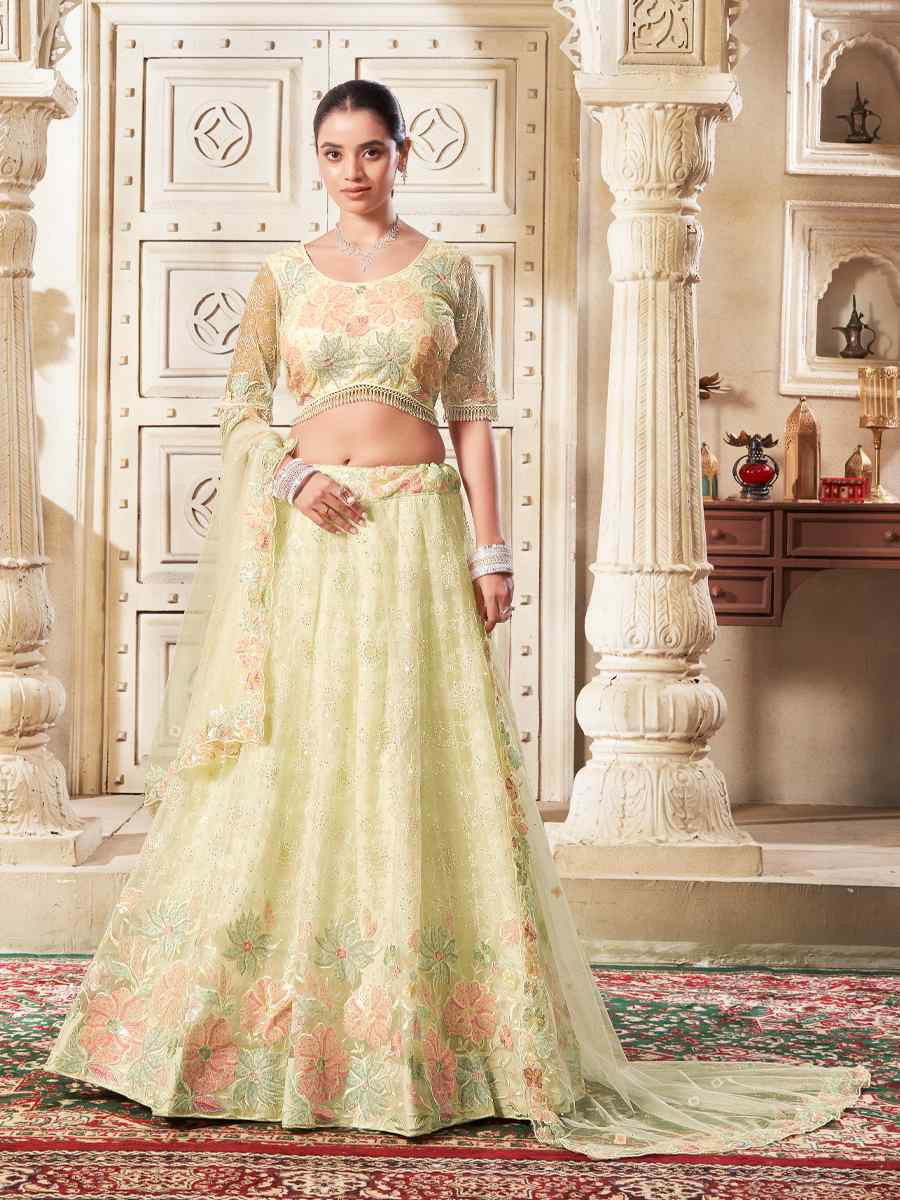 Light Yellow Premium Net Embroidered Reception Party Wear Heavy Border Lehenga Choli