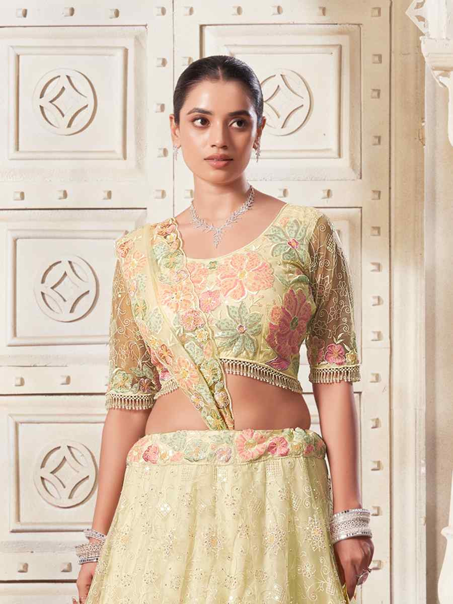 Light Yellow Premium Net Embroidered Reception Party Wear Heavy Border Lehenga Choli