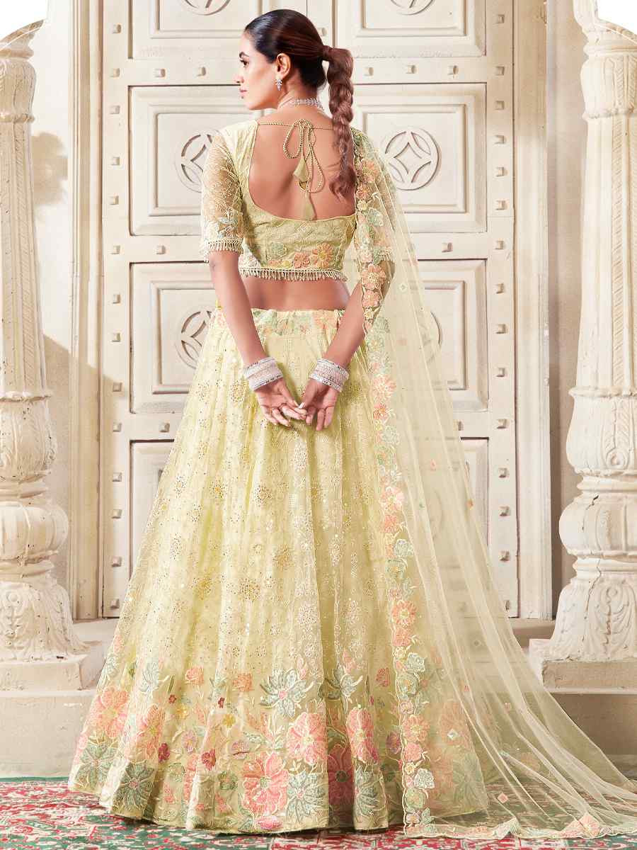 Light Yellow Premium Net Embroidered Reception Party Wear Heavy Border Lehenga Choli