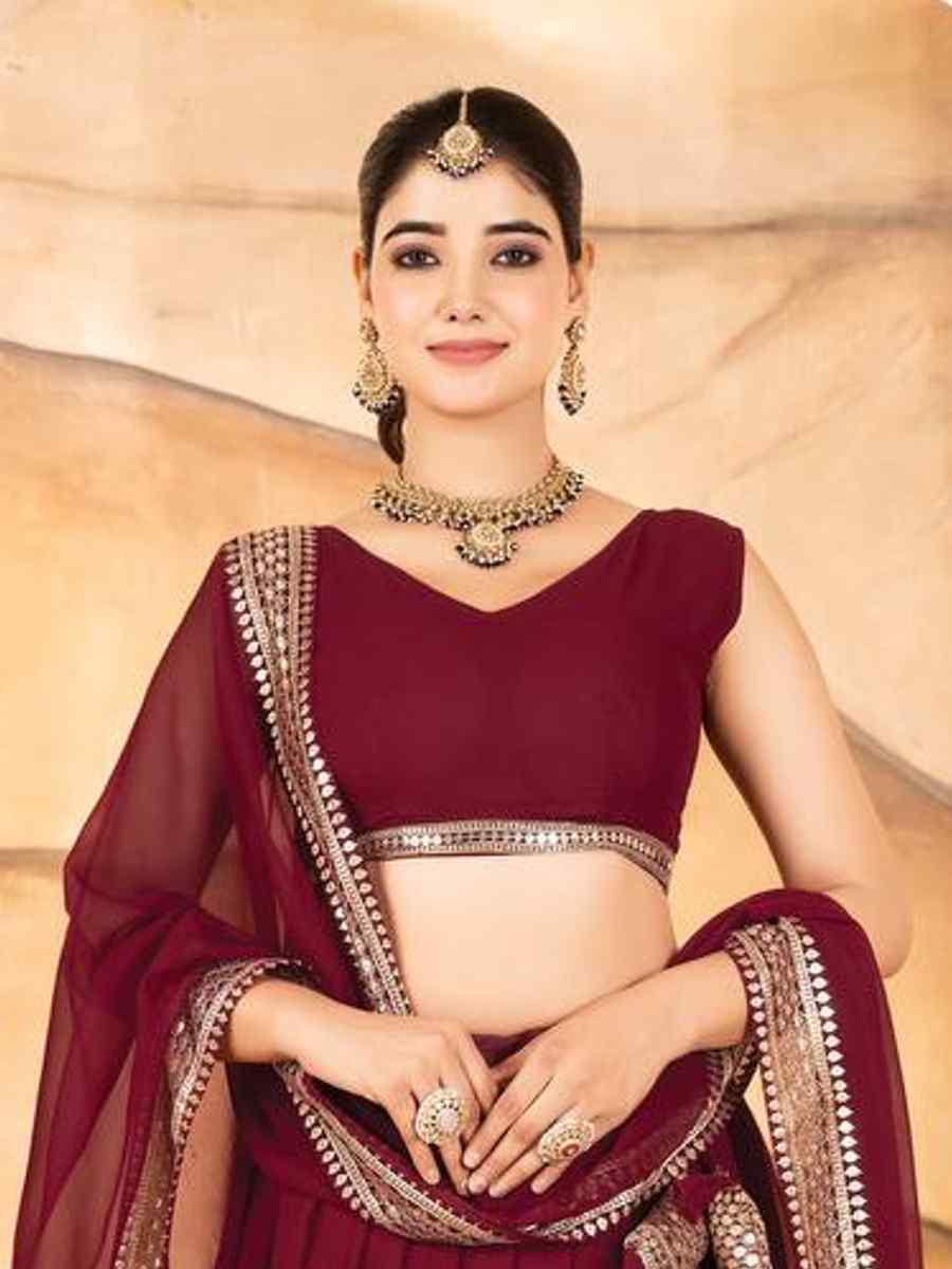 Maroon Faux Blooming Embroidery Reception Party Wear Heavy Border Lehenga Choli