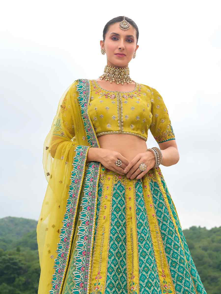 Multi Heavy Silk Embroidery Wedding Reception Party Wear Heavy Border Lehenga Choli