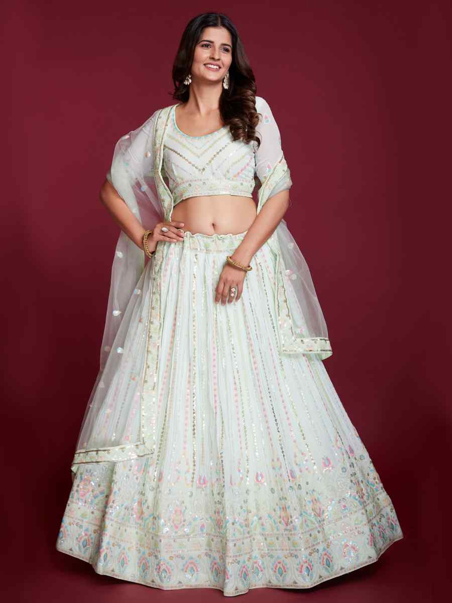 Off White Heavy Georgette Embroidered Reception Party Wear Heavy Border Lehenga Choli