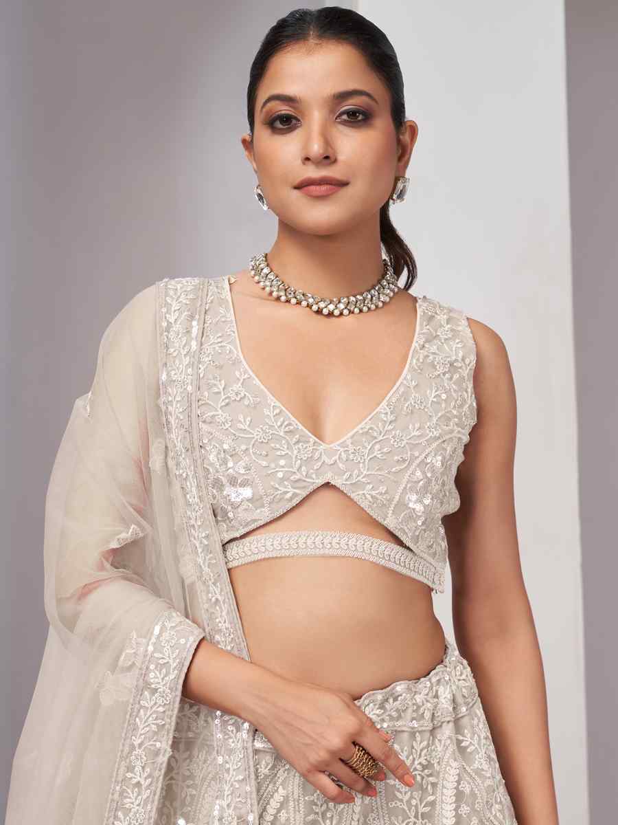 Off White Soft Net Embroidery Bridesmaid Wedding Heavy Border Lehenga Choli