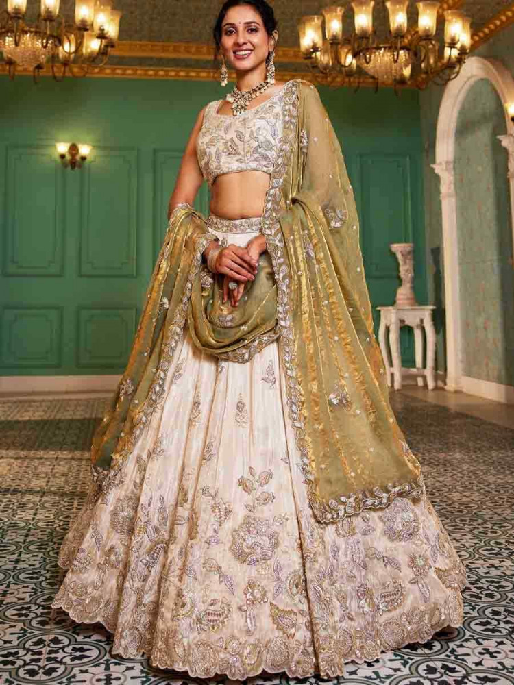 Off White Tissue Embroidery Reception Party Wear Heavy Border Lehenga Choli