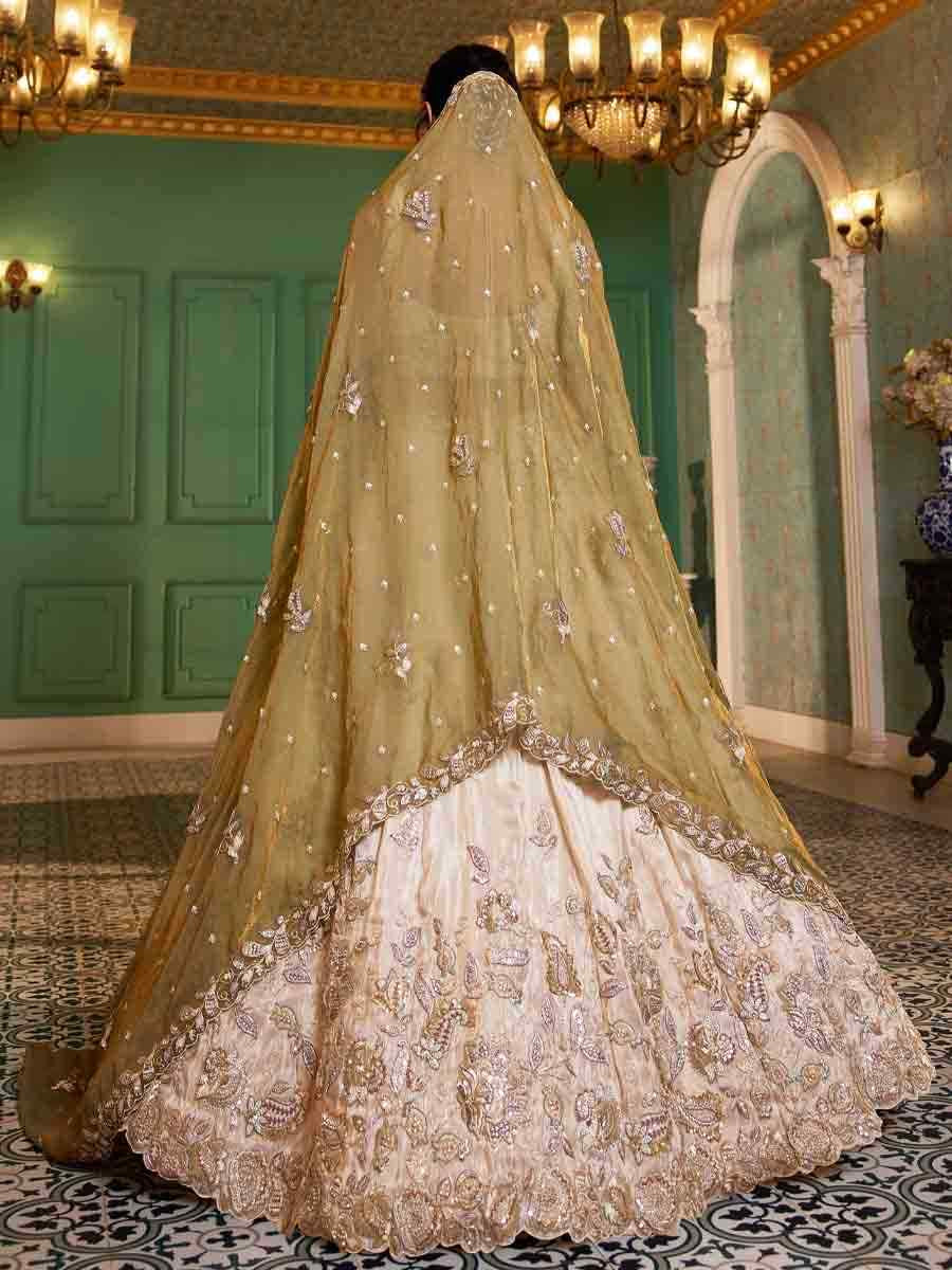 Off White Tissue Embroidery Reception Party Wear Heavy Border Lehenga Choli