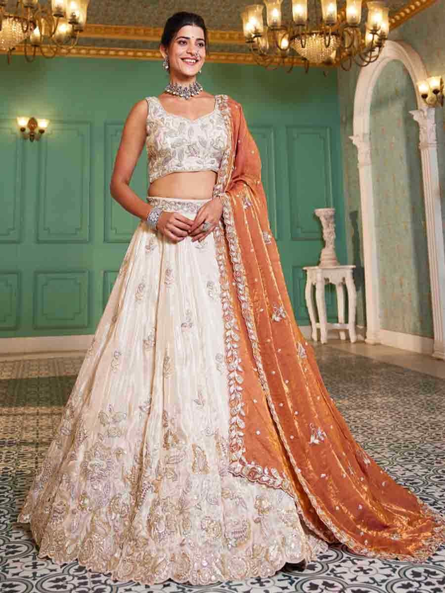 Off White Tissue Embroidery Reception Party Wear Heavy Border Lehenga Choli