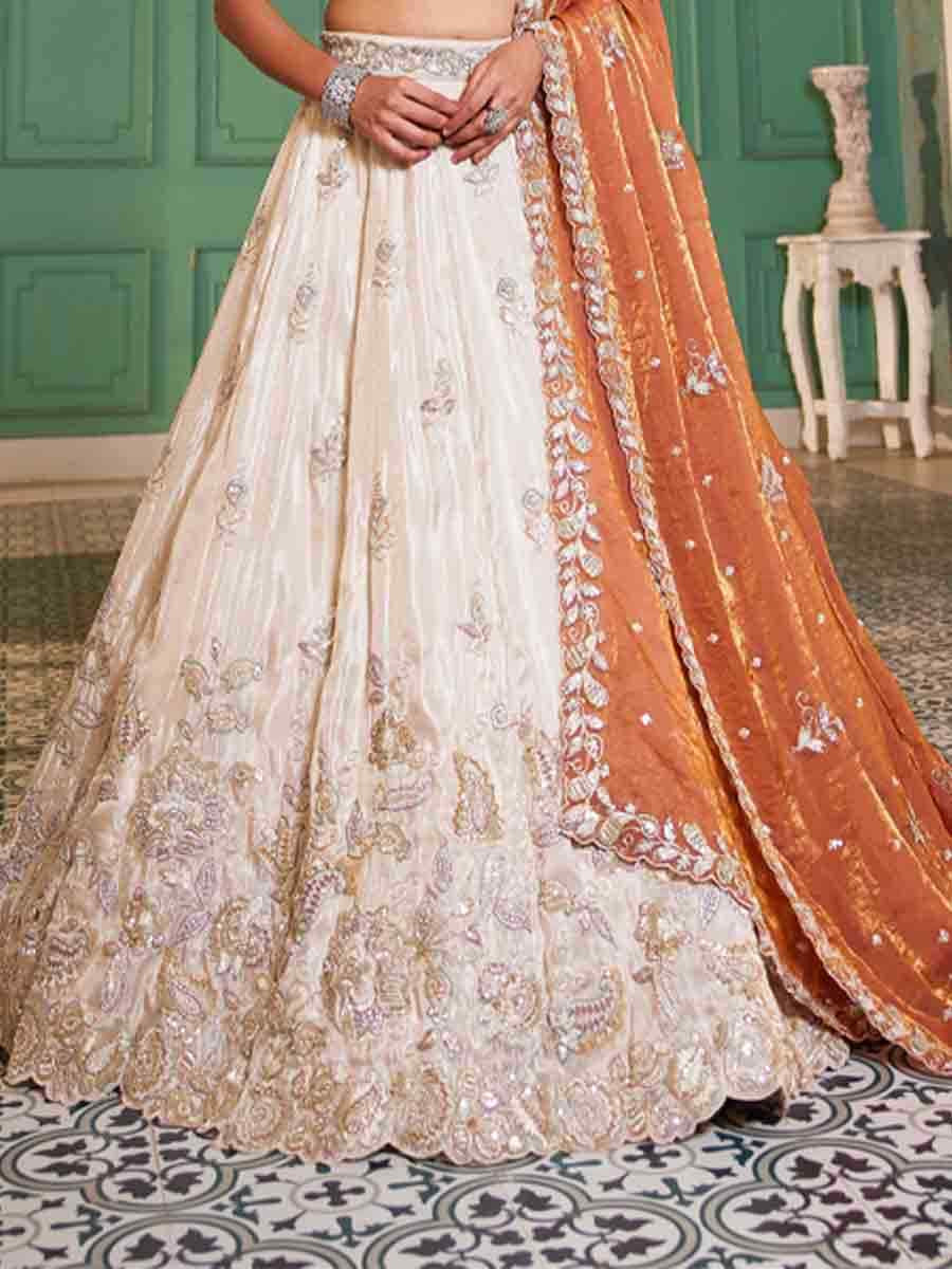 Off White Tissue Embroidery Reception Party Wear Heavy Border Lehenga Choli