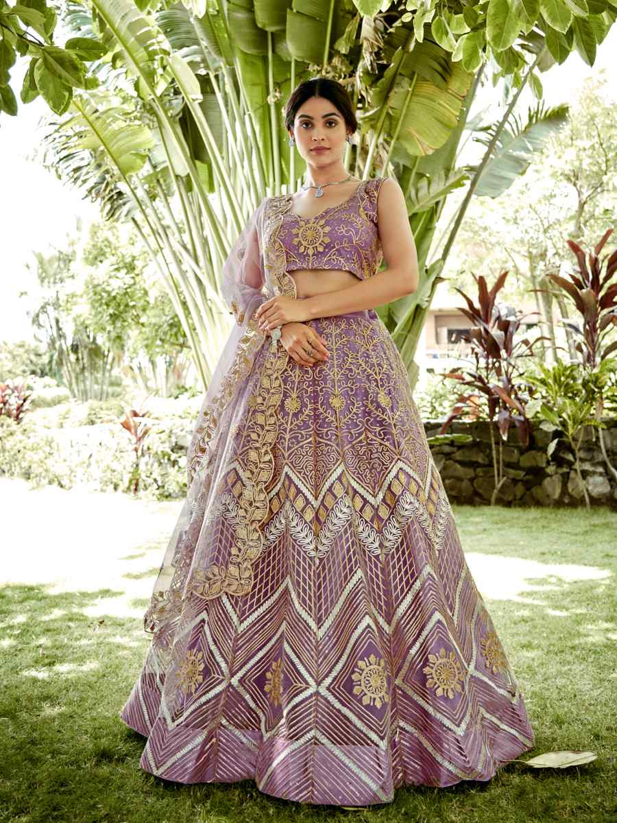 Onion Net Embroidered Wedding Party Wear Heavy Border Lehenga Choli