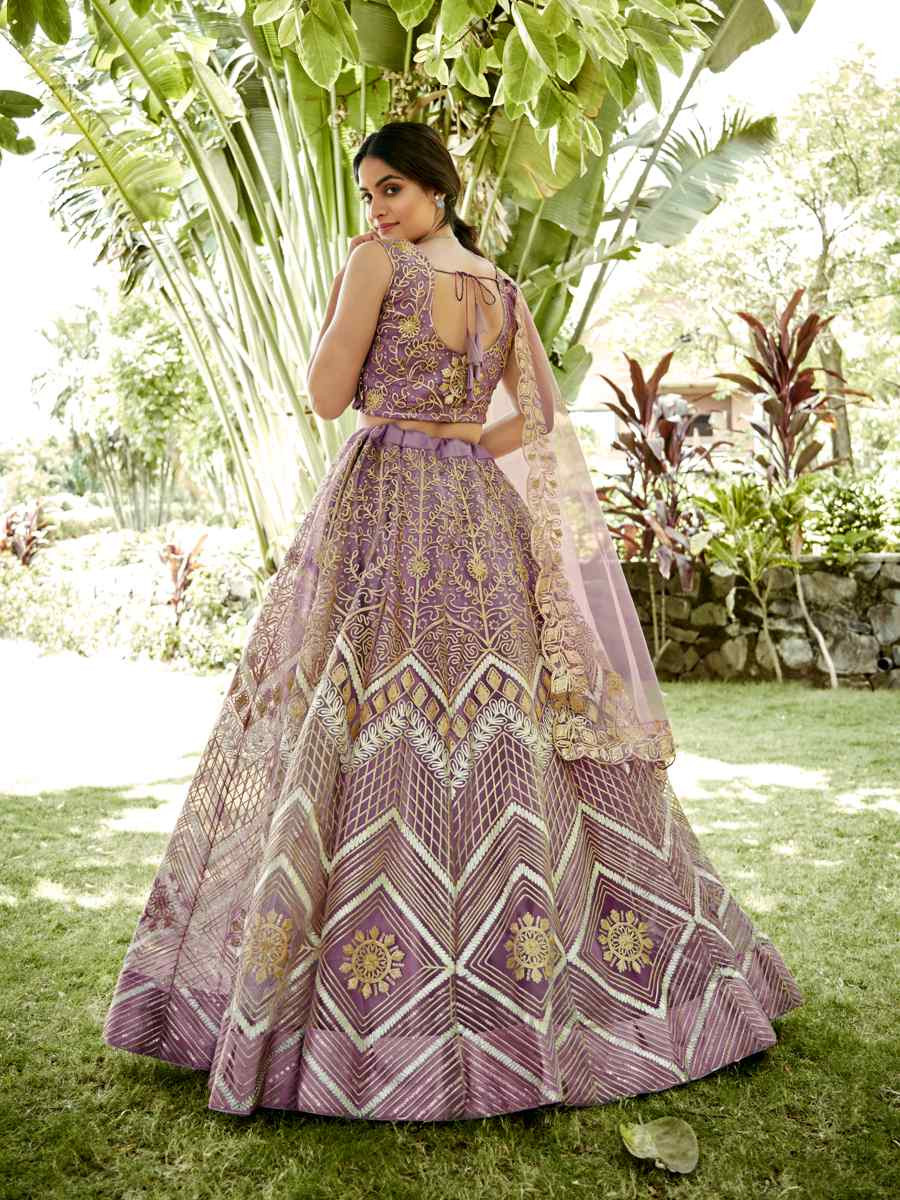 Onion Net Embroidered Wedding Party Wear Heavy Border Lehenga Choli