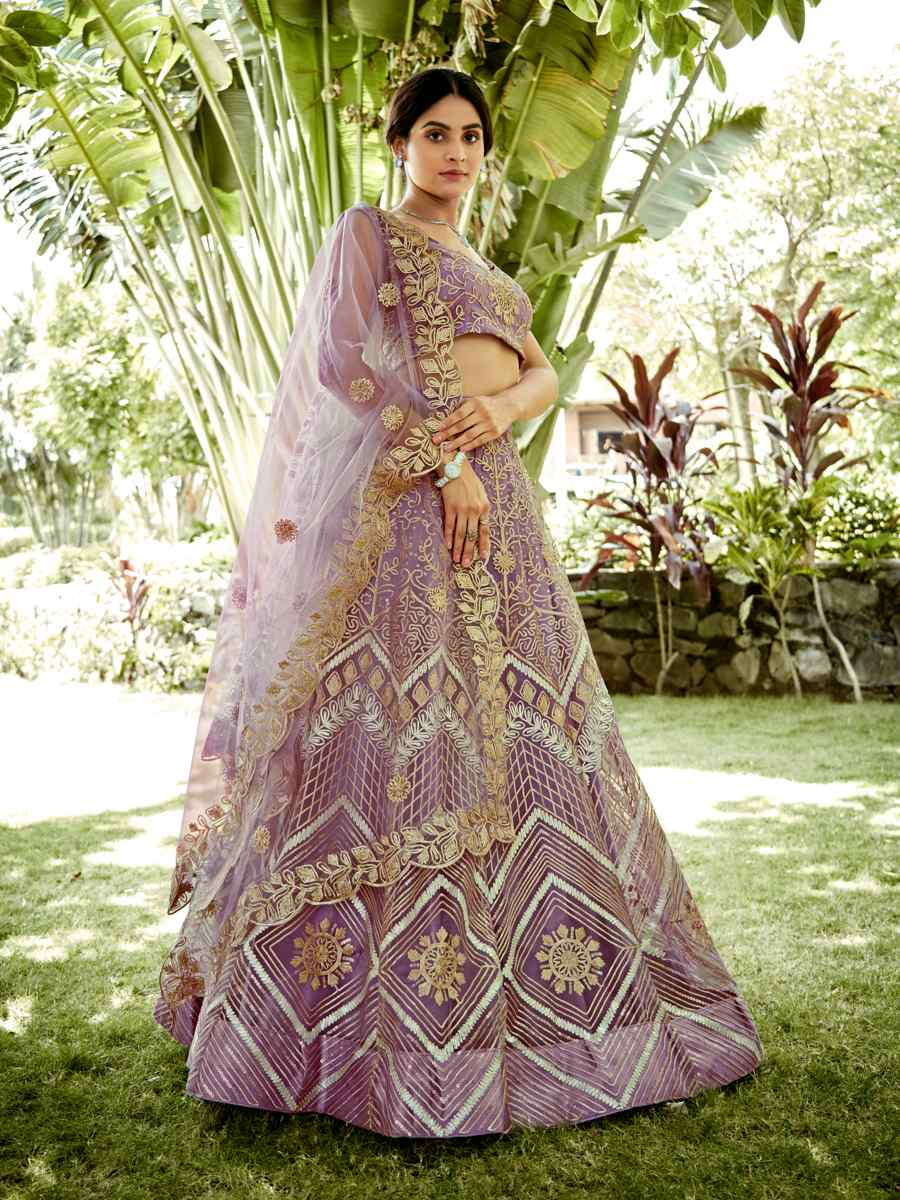 Onion Net Embroidered Wedding Party Wear Heavy Border Lehenga Choli