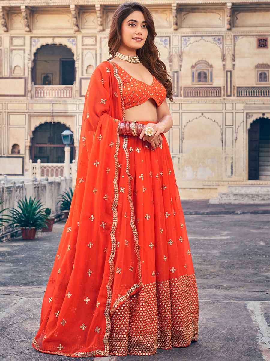 Orange Georgette Embroidered Reception Wedding Heavy Border Lehenga Choli