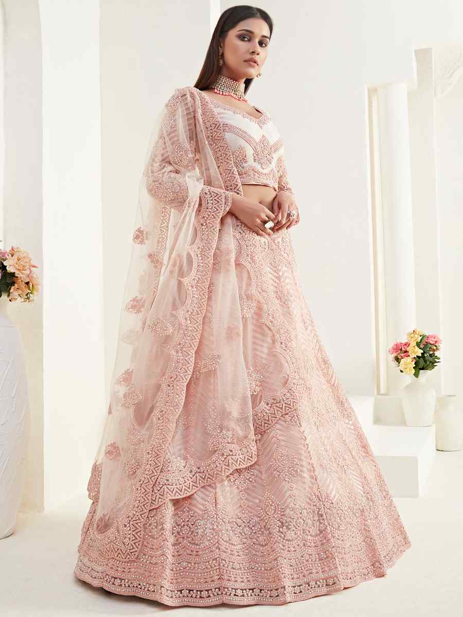 Peach Net Silk Embroidered Bridesmaid Wedding Heavy Border Lehenga Choli