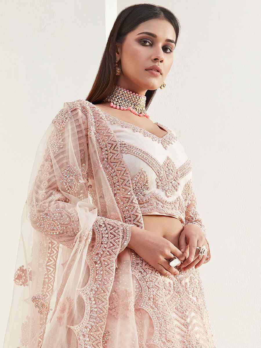 Peach Net Silk Embroidered Bridesmaid Wedding Heavy Border Lehenga Choli