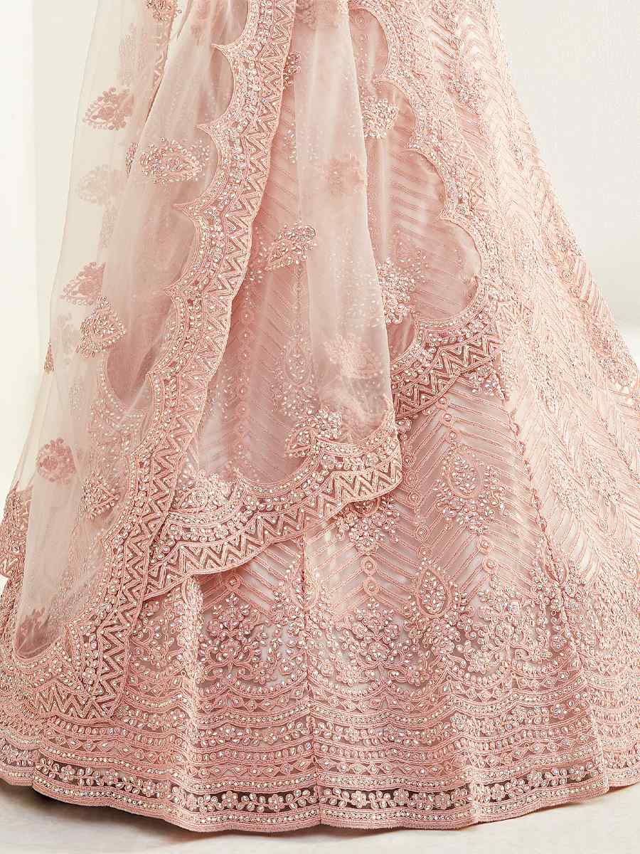 Peach Net Silk Embroidered Bridesmaid Wedding Heavy Border Lehenga Choli