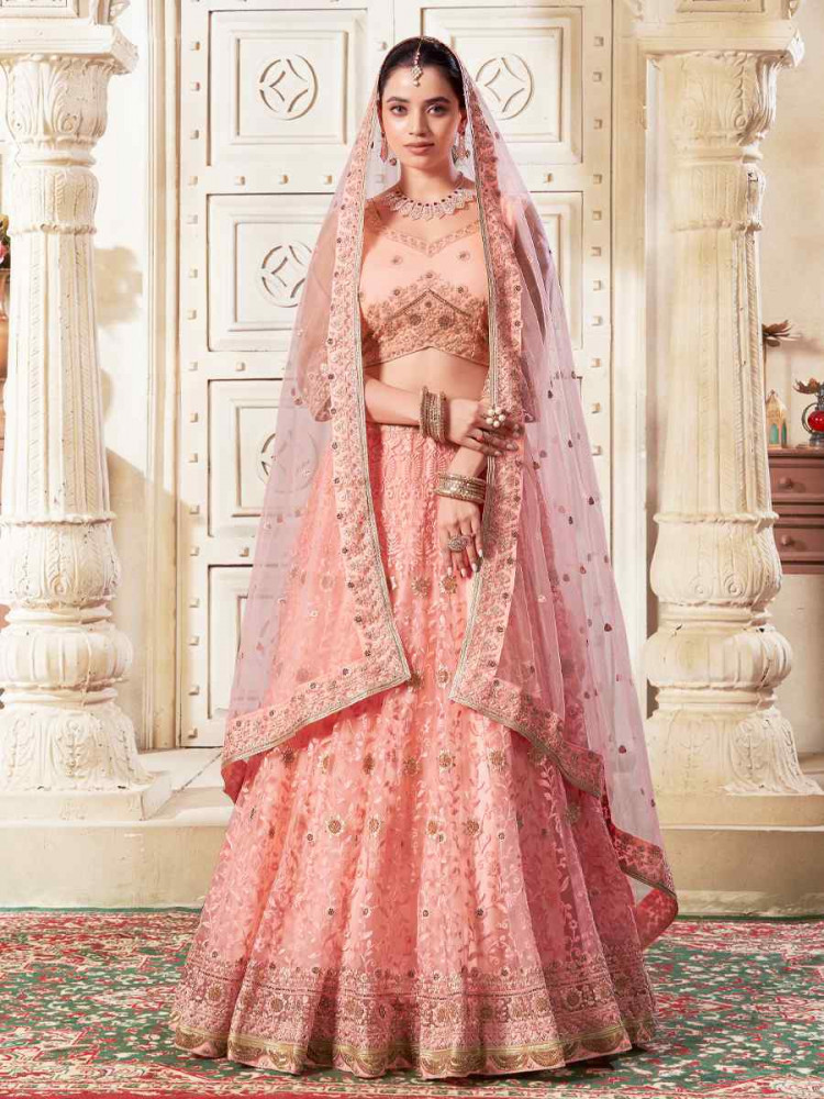 Peach Premium Net Embroidered Reception Party Wear Heavy Border Lehenga Choli