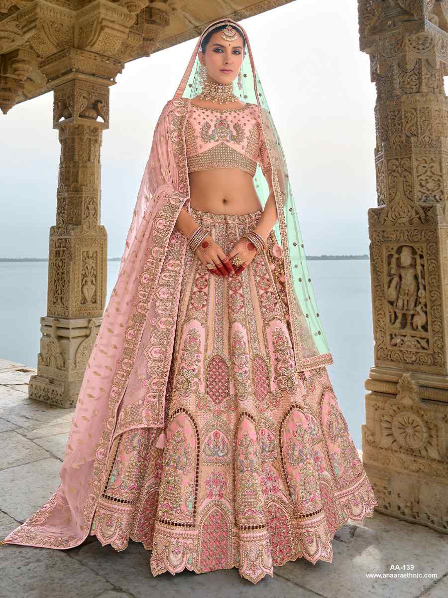 Peach Silk Embroidered Wedding Bridal Heavy Border Lehenga Choli