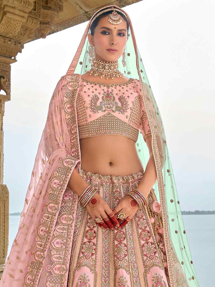 Peach Silk Embroidered Wedding Bridal Heavy Border Lehenga Choli