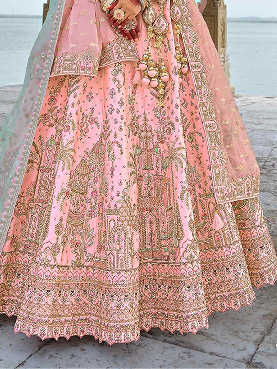 Peach Silk Embroidered Wedding Bridal Heavy Border Lehenga Choli