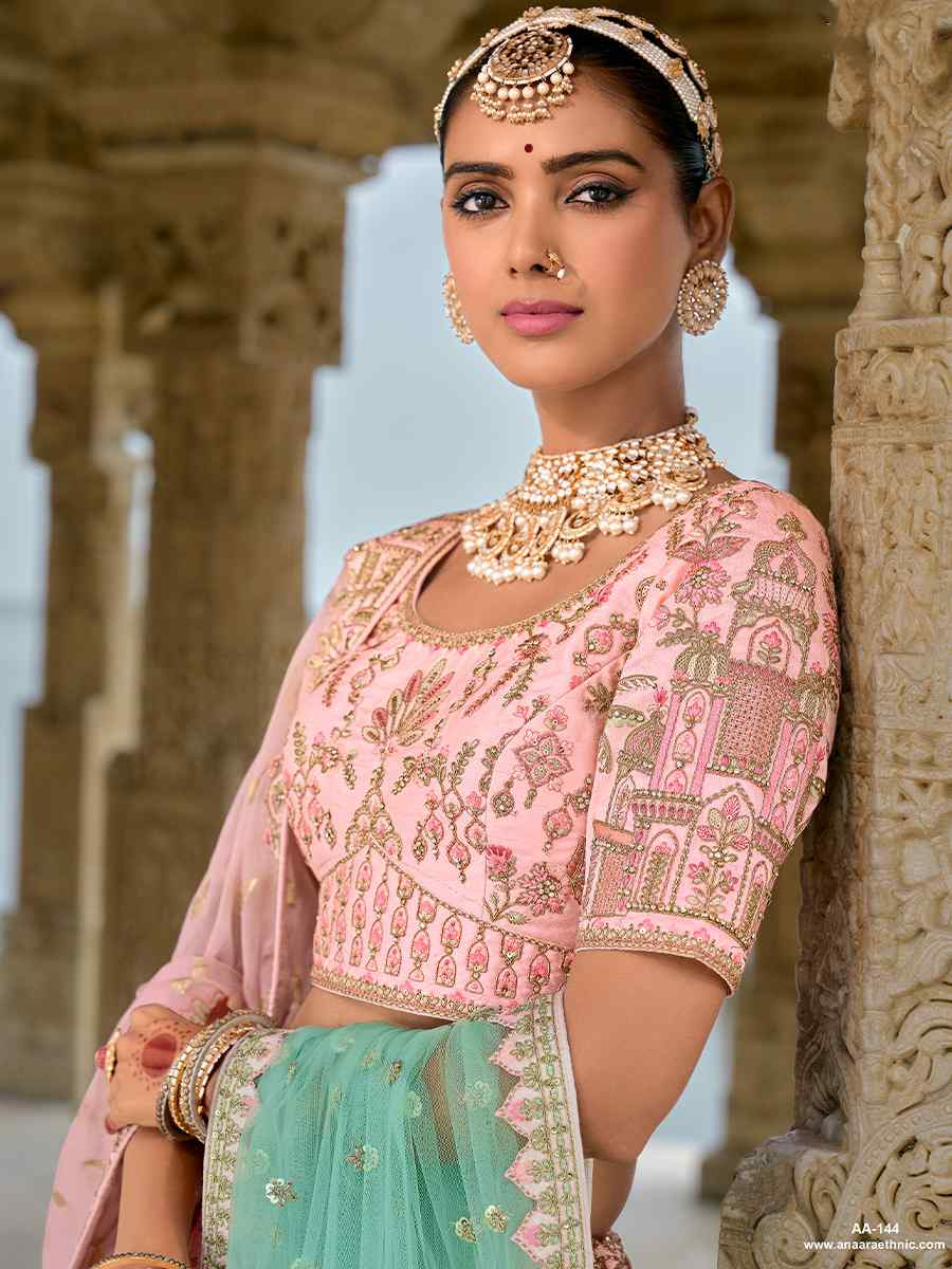 Peach Silk Embroidered Wedding Bridal Heavy Border Lehenga Choli