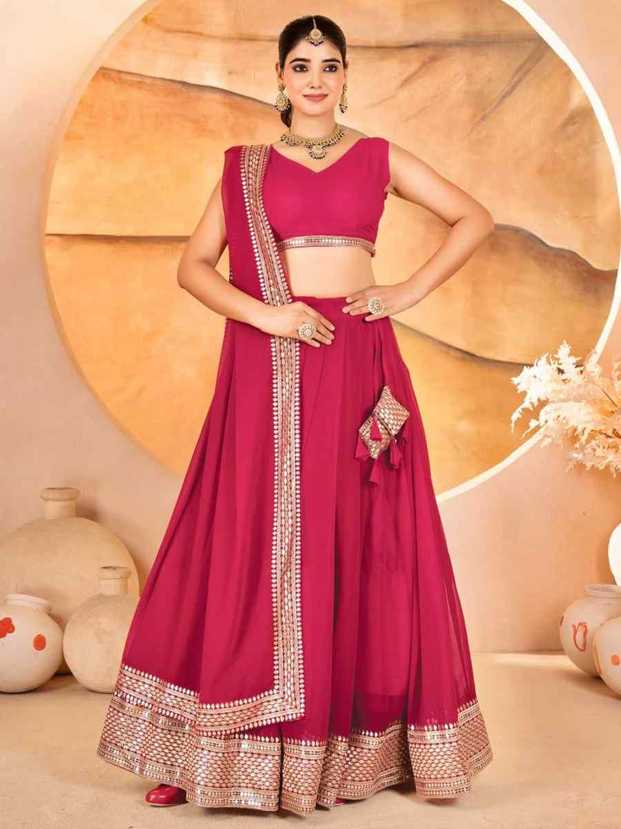 Pink Faux Blooming Embroidery Reception Party Wear Heavy Border Lehenga Choli