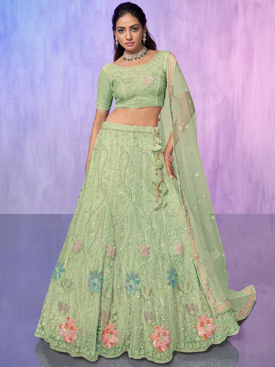 Pista Net Embroidered Bridal Reception Heavy Border Lehenga Choli