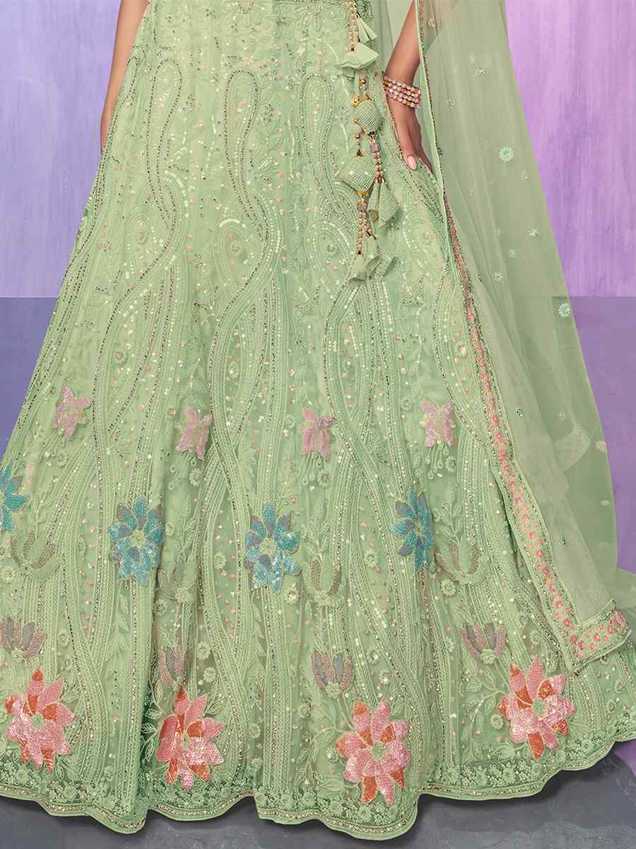 Pista Net Embroidered Bridal Reception Heavy Border Lehenga Choli