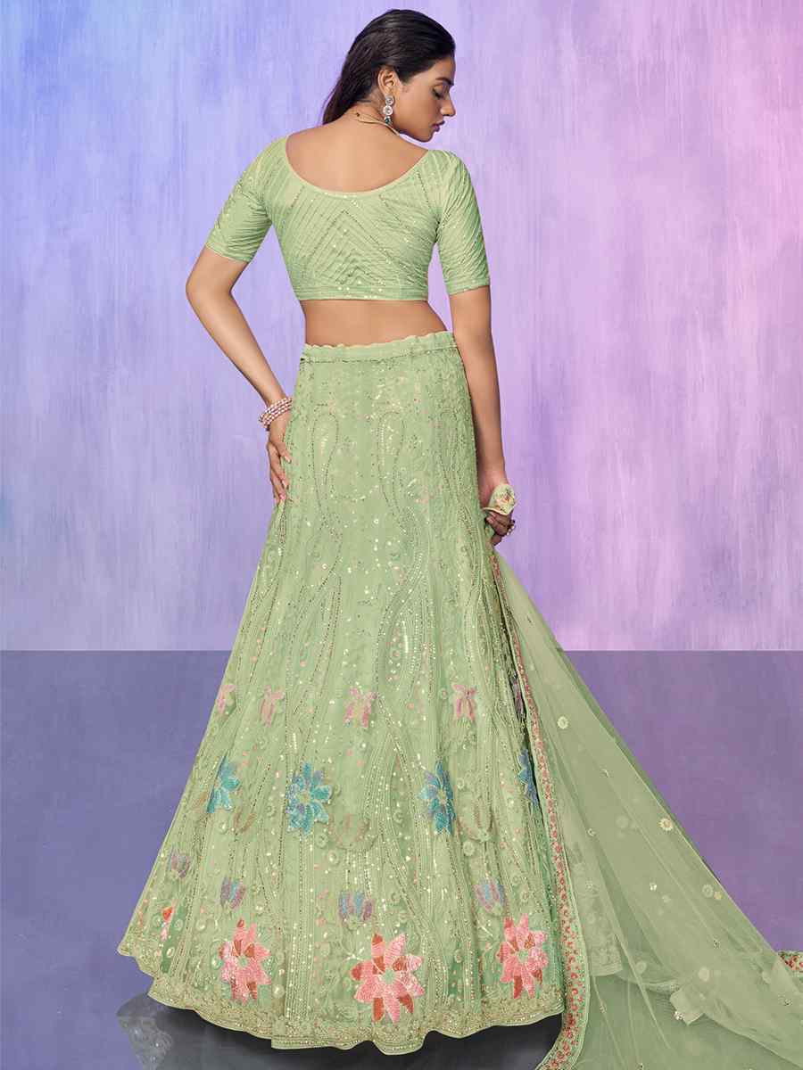 Pista Net Embroidered Bridal Reception Heavy Border Lehenga Choli