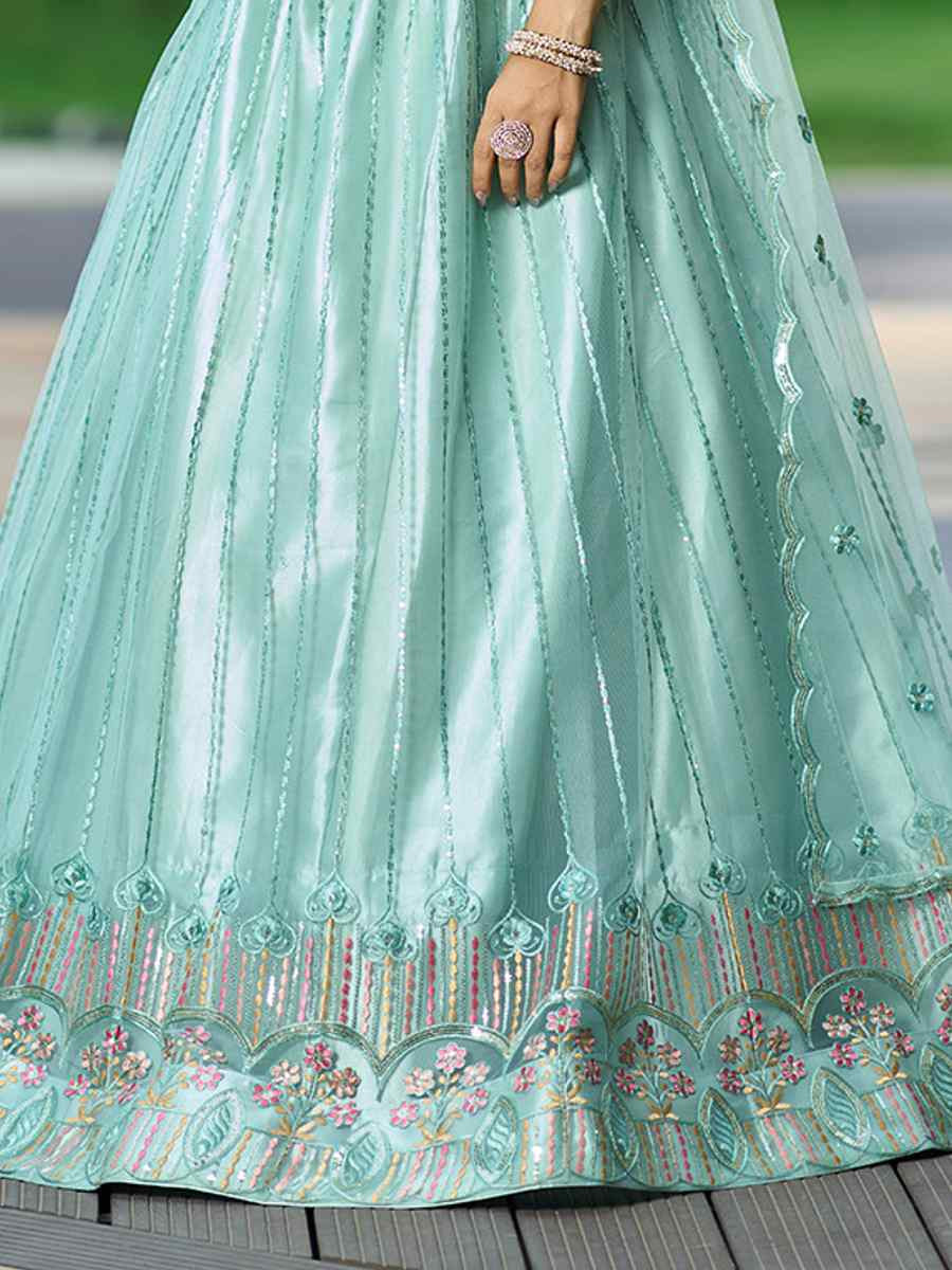 Pista Net Embroidered Wedding Party Wear Heavy Border Lehenga Choli