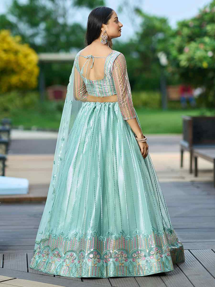 Pista Net Embroidered Wedding Party Wear Heavy Border Lehenga Choli